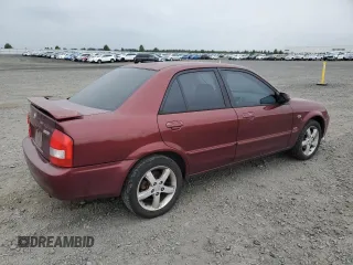 2002 Mazda Protege DX z VIN JM1BJ225320636991, wystawiony jako Copart lot #57915265 z przebiegiem 123 371 mil mil oraz Szkoda całkowita • Salvage title. Historia ofert i sprzedaży dostępna na DreamBid. Obrazek 3.