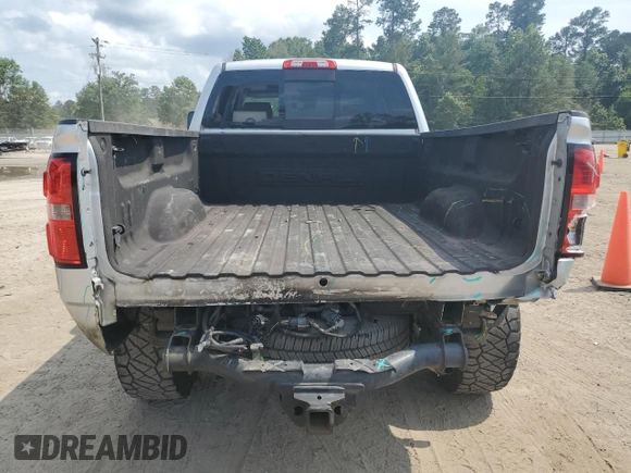2015 GMC Sierra 2500HD Denali z VIN 1GT120E84FF118006, wystawiony jako Copart lot #57758415 z przebiegiem 190 147 mil mil oraz Szkoda całkowita • Salvage title. Historia ofert i sprzedaży dostępna na DreamBid. Obrazek 6.
