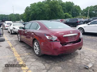 2013 Nissan Maxima SV with VIN 1N4AA5AP9DC825734, listed as a IAAI auction lot 42375819 with 164,735 mi miles and . Bid and sale history available at DreamBid. Image 3.