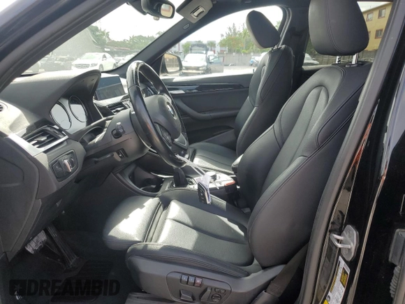 2019 BMW X1 xDrive28i with VIN WBXHT3C59K5L36435, listed as a Copart auction lot 60189985 with 105,110 mi miles and Salvage title. Bid and sale history available at DreamBid. Image 7.