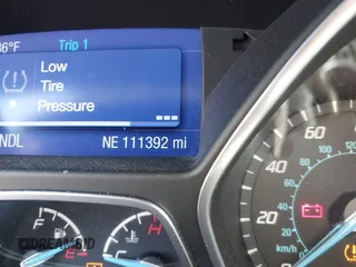 2013 Ford Focus SE with VIN 1FADP3F23DL208410, listed as a IAAI auction lot 42542892 with 111,392 mi miles and . Bid and sale history available at DreamBid. Image 7.