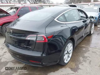 2018 Tesla Model 3 Long Range Battery with VIN 5YJ3E1EB3JF090567, listed as a IAAI auction lot 41568312 with 35,327 mi miles and . Bid and sale history available at DreamBid. Image 4.