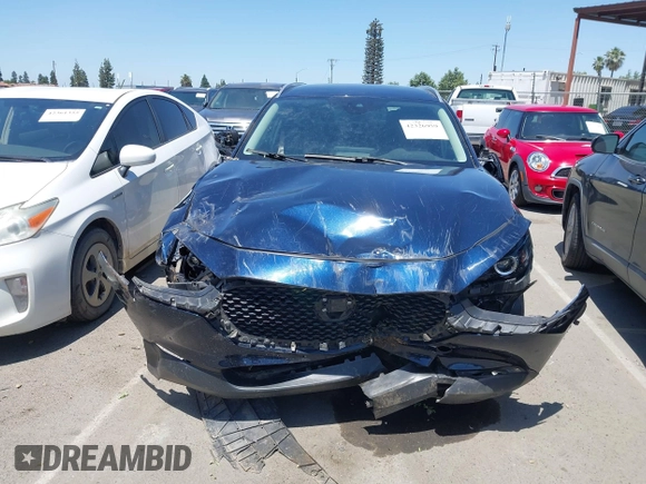 2023 Mazda CX-30 S Select with VIN 3MVDMBBM3PM514030, listed as a IAAI auction lot 42326959 with 41,226 mi miles and . Bid and sale history available at DreamBid. Image 12.