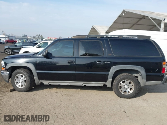 2004 Chevrolet Suburban LT z VIN 3GNFK16T44G206586, wystawiony jako IAAI lot #41480840 z przebiegiem Nie podano mil oraz . Historia ofert i sprzedaży dostępna na DreamBid. Obrazek 13.