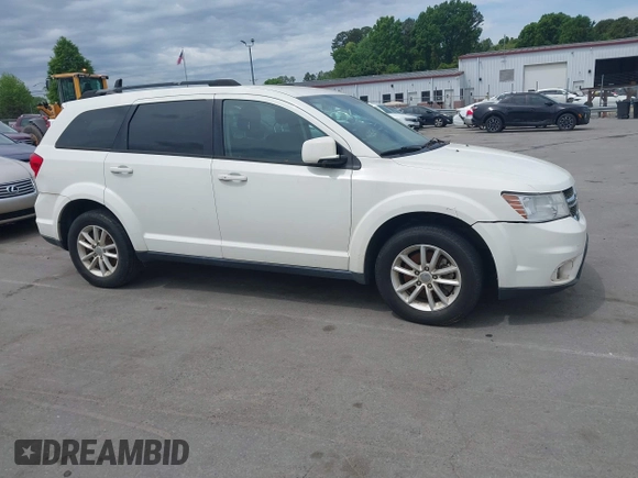 2017 Dodge Journey SXT with VIN 3C4PDCBG4HT572573, listed as a IAAI auction lot 42036006 with 209,854 mi miles and . Bid and sale history available at DreamBid. Image 13.