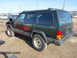 1996 Jeep Cherokee Sport with VIN 1J4FJ68S2TL299150, listed as a IAAI auction lot 41932867 with 142,761 mi miles. Bid and sale history available at carsss.com. Image 3.