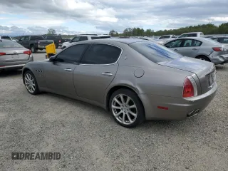 2005 Maserati Quattroporte z VIN ZAMCE39A050017377, wystawiony jako Copart lot #50191415 z przebiegiem 39 545 mil mil oraz Czysty tytuł • Clean title. Historia ofert i sprzedaży dostępna na DreamBid. Obrazek 2.