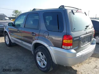 2006 Ford Escape Hybrid with VIN 1FMCU96H76KA56562, listed as a IAAI auction lot 42096713 with 148,963 mi miles. Bid and sale history available at carsss.com. Image 3.