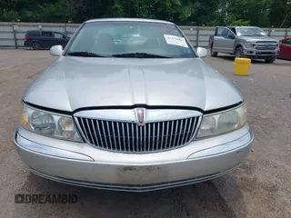 1999 Lincoln Continental с VIN 1LNHM97V7XY607937, выставлен на аукционе IAAI как лот 42473686 с пробегом 171 044 миль миль и . История ставок и продаж доступна на DreamBid. Изображение 6.