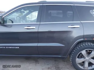 2014 Jeep Grand Cherokee Overland with VIN 1C4RJFCT8EC380899, listed as a IAAI auction lot 41372034 with 140,413 mi miles. Bid and sale history available at carsss.com. Image 15.