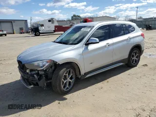 2018 BMW X1 xDrive28i with VIN WBXHT3C39J5K25722, listed as a Copart auction lot 46668855 with 63,533 mi miles and Salvage Title. Bid and sale history available at carsss.com. Image 1.