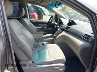 2012 Honda Odyssey EX-L with VIN 5FNRL5H67CB041252, listed as a IAAI auction lot 42158494 with 152,940 mi miles and . Bid and sale history available at DreamBid. Image 5.