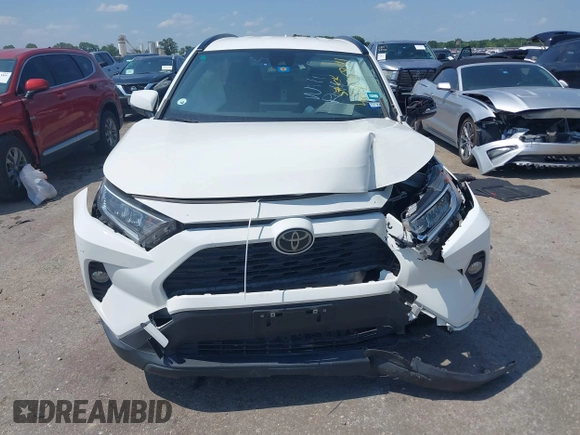 2021 Toyota RAV4 XLE with VIN JTMW1RFV2MD063839, listed as a IAAI auction lot 42406891 with 69,490 mi miles and . Bid and sale history available at DreamBid. Image 12.