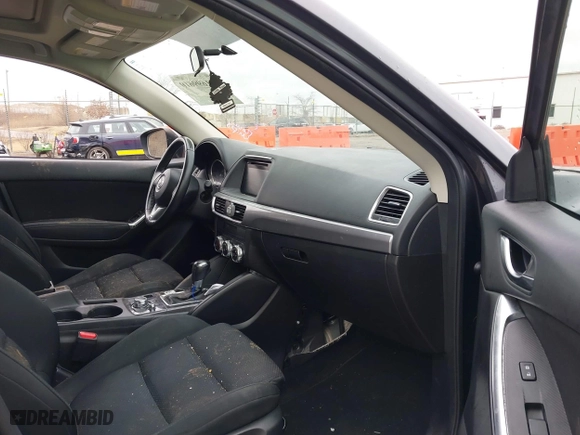 2016 Mazda CX-5 Touring with VIN JM3KE4CY7G0715507, listed as a IAAI auction lot 41699610 with 108,206 mi miles. Bid and sale history available at carsss.com. Image 5.