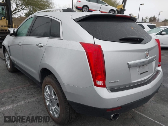 2016 Cadillac SRX Luxury Collection z VIN 3GYFNBE38GS520891, wystawiony jako IAAI lot #41781445 z przebiegiem 52 202 mil mil oraz . Historia ofert i sprzedaży dostępna na DreamBid. Obrazek 3.