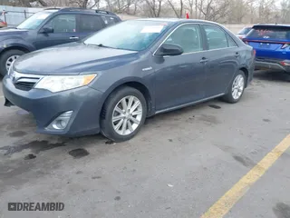 2012 Toyota Camry Hybrid XLE with VIN 4T1BD1FK9CU059021, listed as a IAAI auction lot 41932696 with 194,292 mi miles. Bid and sale history available at carsss.com. Image 2.