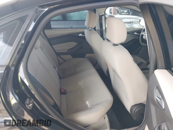 2015 Ford Focus SE with VIN 1FADP3F25FL330463, listed as a IAAI auction lot 41755867 with 72,725 mi miles. Bid and sale history available at carsss.com. Image 8.