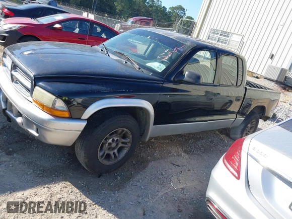 2003 Dodge Dakota SLT with VIN 1D7HL48X93S151422, listed as a IAAI auction lot 40661577 with 238,586 mi miles. Bid and sale history available at carsss.com. Image 2.