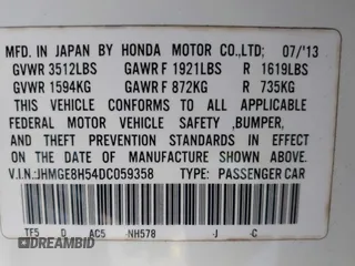 2013 Honda Fit Sport with VIN JHMGE8H54DC059358, listed as a IAAI auction lot 41776717 with 90,595 mi miles. Bid and sale history available at carsss.com. Image 9.