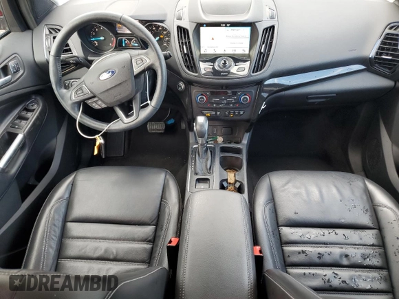 2019 Ford Escape Titanium with VIN 1FMCU0J98KUC00873, listed as a Copart auction lot 61674305 with 53,554 mi miles and Salvage title. Bid and sale history available at DreamBid. Image 8.