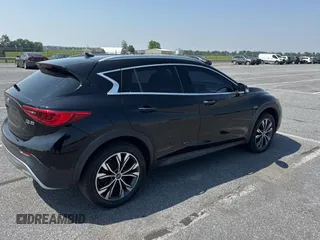 2018 Infiniti QX30 Premium with VIN SJKCH5CR4JA044802, listed as a Copart auction lot 59876905 with 89,177 mi miles and Clean title. Bid and sale history available at DreamBid. Image 4.