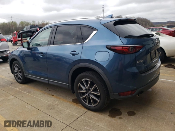 2018 Mazda CX-5 Grand Touring with VIN JM3KFADM8J1351624, listed as a Copart auction lot 50965465 with 66,210 mi miles and Salvage Title. Bid and sale history available at DreamBid. Image 2.