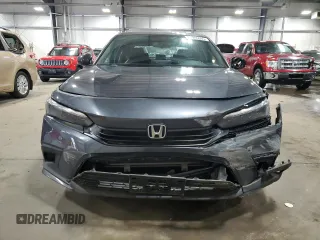 2023 Honda Civic Sport z VIN 2HGFE2F58PH543002, wystawiony jako Copart lot #53985065 z przebiegiem 11 015 mil mil oraz Szkoda całkowita • Salvage title. Historia ofert i sprzedaży dostępna na DreamBid. Obrazek 5.