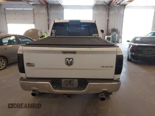 2015 Ram 1500 Laramie Limited with VIN 1C6RR7WM6FS678840, listed as a IAAI auction lot 42040449 with Not provided miles and . Bid and sale history available at DreamBid. Image 16.