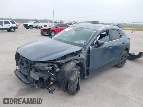 2023 Mazda CX-30 S Carbon Edition with VIN 3MVDMBCM0PM532449, listed as a IAAI auction lot 41799255 with 60,604 mi miles and . Bid and sale history available at DreamBid. Image 19.