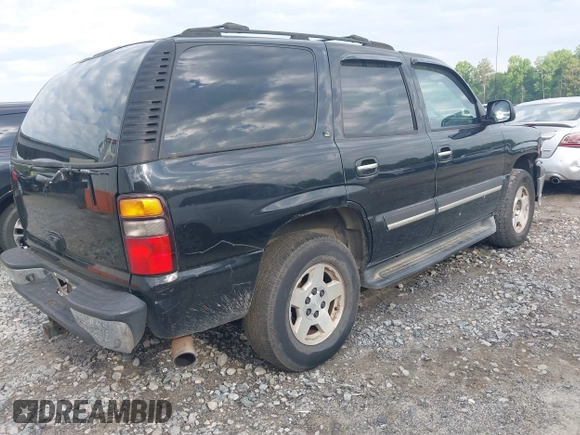2005 Chevrolet Tahoe Z71 with VIN 1GNEC13T85R213569, listed as a IAAI auction lot 42229453 with 371,339 mi miles and . Bid and sale history available at DreamBid. Image 4.