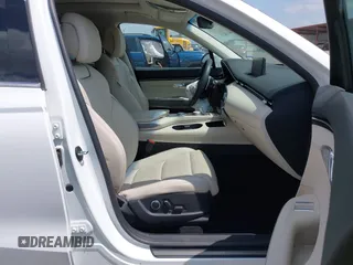 2023 Genesis GV70 2.5T with VIN KMUMADTB7PU139111, listed as a IAAI auction lot 42391876 with 13,157 mi miles and . Bid and sale history available at DreamBid. Image 5.
