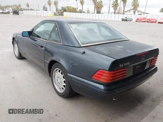 1996 Mercedes-Benz SL-Class with VIN WDBFA67F6TF131910, listed as a IAAI auction lot 41797208 with 93,122 mi miles. Bid and sale history available at carsss.com. Image 3.