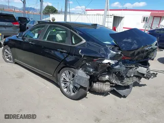 2018 Genesis G80 3.8L with VIN KMHGN4JE3JU225567, listed as a IAAI auction lot 41945232 with 74,953 mi miles. Bid and sale history available at carsss.com. Image 3.