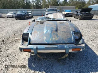 1980 Datsun 280ZX z VIN HGS130150951, wystawiony jako Copart lot #75949554 z przebiegiem 35 942 mil mil oraz Szkody całkowita. Historia ofert i sprzedaży dostępna na DreamBid. Obrazek 5.