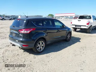 2013 Ford Escape SEL with VIN 1FMCU0HX3DUC67212, listed as a IAAI auction lot 42045568 with 142,382 mi miles. Bid and sale history available at carsss.com. Image 4.