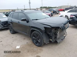 2019 Jeep Cherokee Latitude Plus with VIN 1C4PJLLB0KD487223, listed as a IAAI auction lot 41627105 with 157,018 mi miles. Bid and sale history available at carsss.com. Image 1.