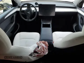 2024 Tesla Model Y Long Range z VIN 7SAYGDEEXRF072397, wystawiony jako Copart lot #61157535 z przebiegiem Nie podano mil oraz Szkoda całkowita • Salvage title. Historia ofert i sprzedaży dostępna na DreamBid. Obrazek 8.