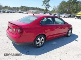 2009 Volkswagen Jetta SE z VIN 3VWRZ71K19M042108, wystawiony jako IAAI lot #41876859 z przebiegiem 187 206 mil mil oraz . Historia ofert i sprzedaży dostępna na DreamBid. Obrazek 4.