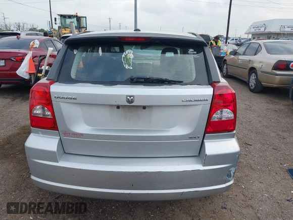 2009 Dodge Caliber SXT with VIN 1B3HB48A59D143888, listed as a IAAI auction lot 42110334 with 182,674 mi miles and . Bid and sale history available at DreamBid. Image 17.