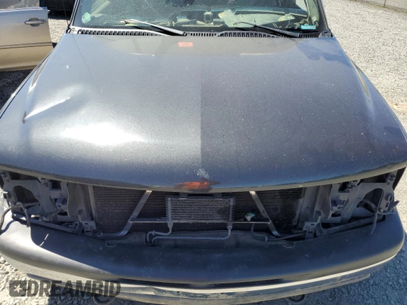 2004 Chevrolet Tahoe Z71 z VIN 1GNEK13Z64R270410, wystawiony jako Copart lot #58807635 z przebiegiem Nie podano mil oraz Szkoda całkowita • Salvage title. Historia ofert i sprzedaży dostępna na DreamBid. Obrazek 12.