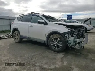 2018 Toyota RAV4 XLE with VIN 2T3WFREV1JW471752, listed as a Copart auction lot 46952565 with 87,705 mi miles and Salvage Title. Bid and sale history available at DreamBid. Image 11.