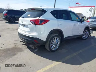 2015 Mazda CX-5 Grand Touring with VIN JM3KE4DY5F0526335, listed as a IAAI auction lot 41756046 with 1 mi miles. Bid and sale history available at carsss.com. Image 4.