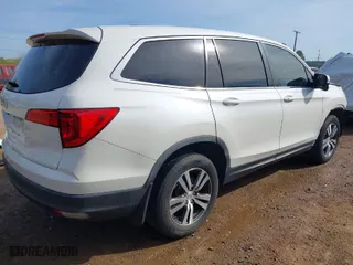 2017 Honda Pilot EX-L with VIN 5FNYF5H58HB044131, listed as a IAAI auction lot 41843395 with 122,311 mi miles. Bid and sale history available at carsss.com. Image 4.