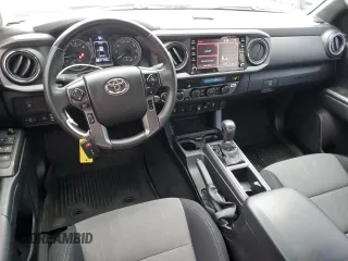 2021 Toyota Tacoma SR with VIN 3TMCZ5AN4MM402889, listed as a Copart auction lot 59942695 with 61,504 mi miles and Salvage title. Bid and sale history available at DreamBid. Image 8.