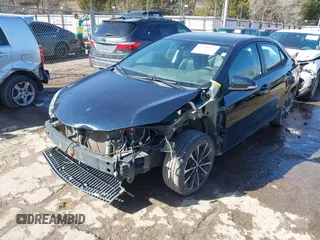 2017 Toyota Corolla L z VIN 5YFBURHE0HP721258, wystawiony jako IAAI lot #41706824 z przebiegiem 158 554 mil mil oraz . Historia ofert i sprzedaży dostępna na DreamBid. Obrazek 2.