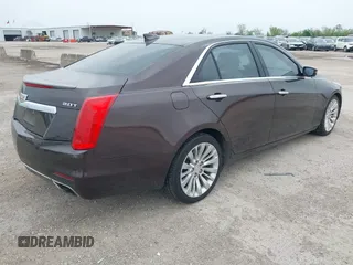 2016 Cadillac CTS Luxury Collection RWD z VIN 1G6AR5SX7G0111806, wystawiony jako IAAI lot #41908192 z przebiegiem 86 309 mil mil oraz . Historia ofert i sprzedaży dostępna na DreamBid. Obrazek 4.