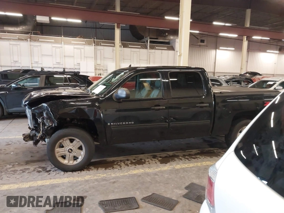 2009 Chevrolet Silverado 1500 LT with VIN 3GCEK23329G114477, listed as a IAAI auction lot 41653641 with 163,105 mi miles and . Bid and sale history available at DreamBid. Image 14.