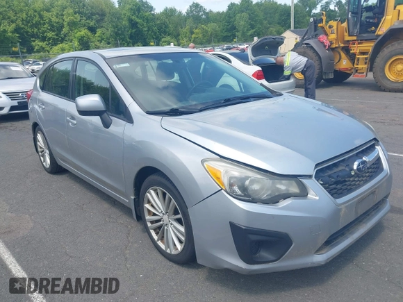 2012 Subaru Impreza Premium with VIN JF1GPAD68CH219928, listed as a IAAI auction lot 42362379 with 209,514 mi miles and . Bid and sale history available at DreamBid. Image 1.