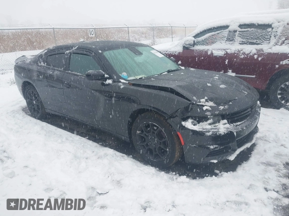 2015 Dodge Charger SXT with VIN 2C3CDXJG8FH746291, listed as a IAAI auction lot 41102488 with 189,971 mi miles. Bid and sale history available at carsss.com. Image 1.