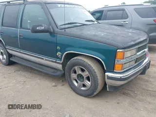 1997 Chevrolet Tahoe z VIN 1GNEK13R1VJ431942, wystawiony jako IAAI lot #42209337 z przebiegiem 311 798 mil mil oraz . Historia ofert i sprzedaży dostępna na DreamBid. Obrazek 1.